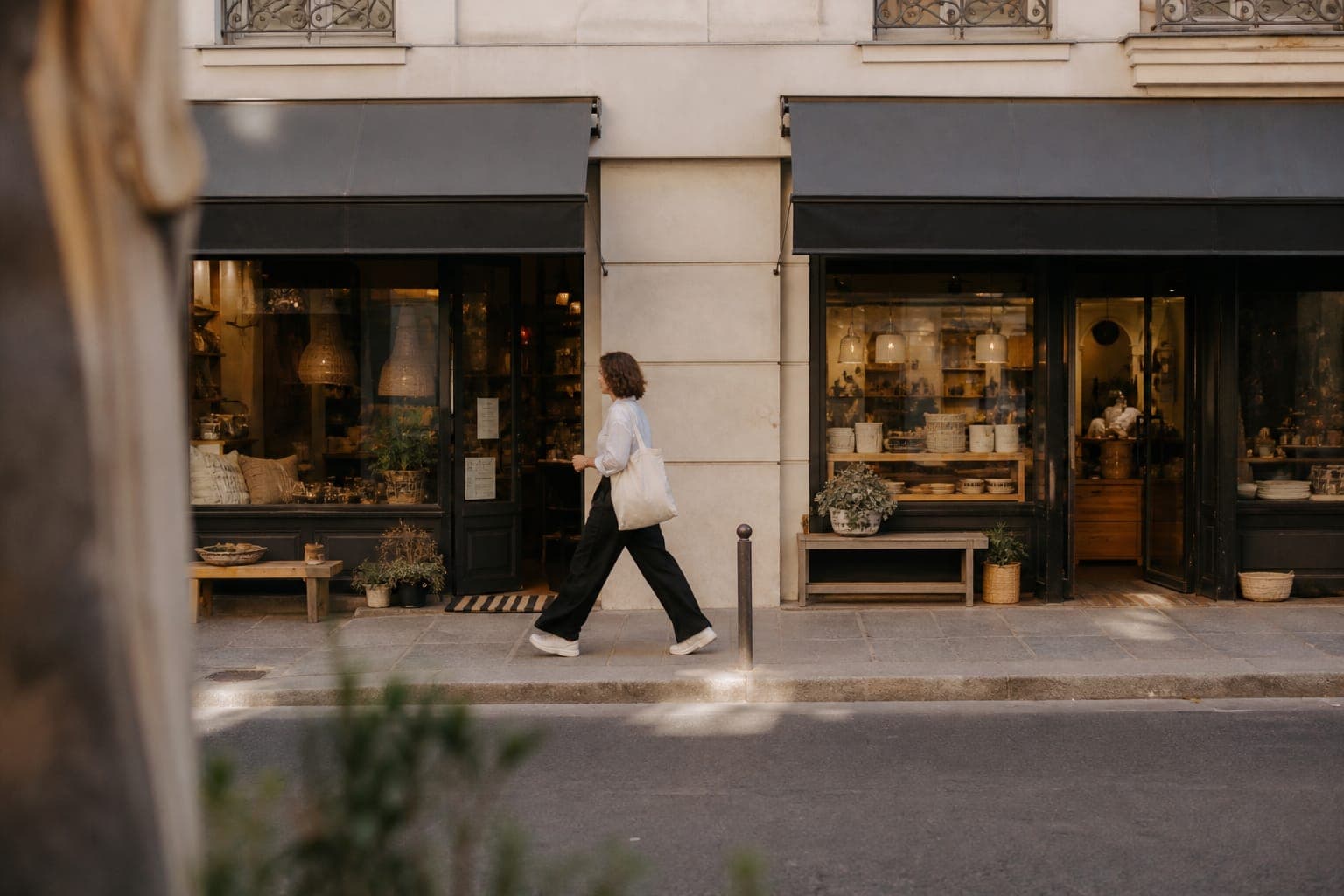 Two storefronts of the same shop on one street